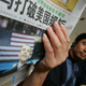The Global Times front page reads “Obama smashes established American practice,” in response to the 2008 US presidential election.